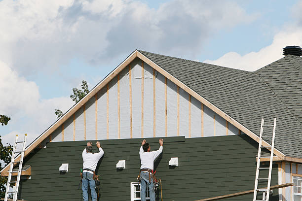 Professional Siding Repair technician working in Lawrenceville, GA